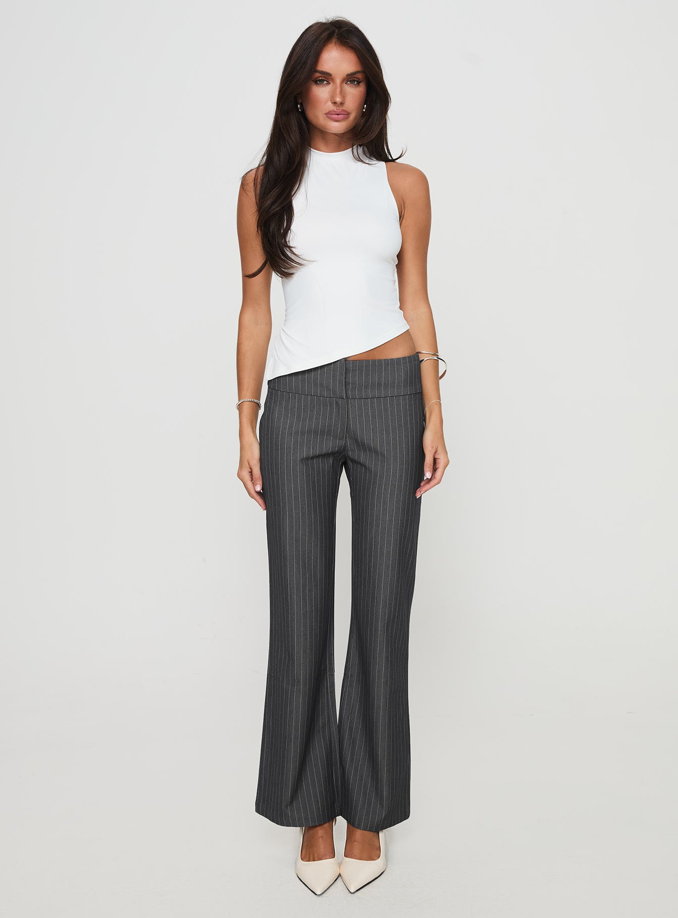 side view of model wearing Princess Polly Isabeau Pant Grey Pinstripe Low Rise Pants 