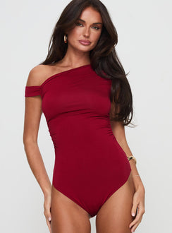 front view of model wearing Princess Polly Beller Bodysuit Red Sleeveless 
