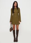 back view of model wearing Princess Polly Lukea Long Sleeve Mini Dress Olive Ribbed Boat Neck 