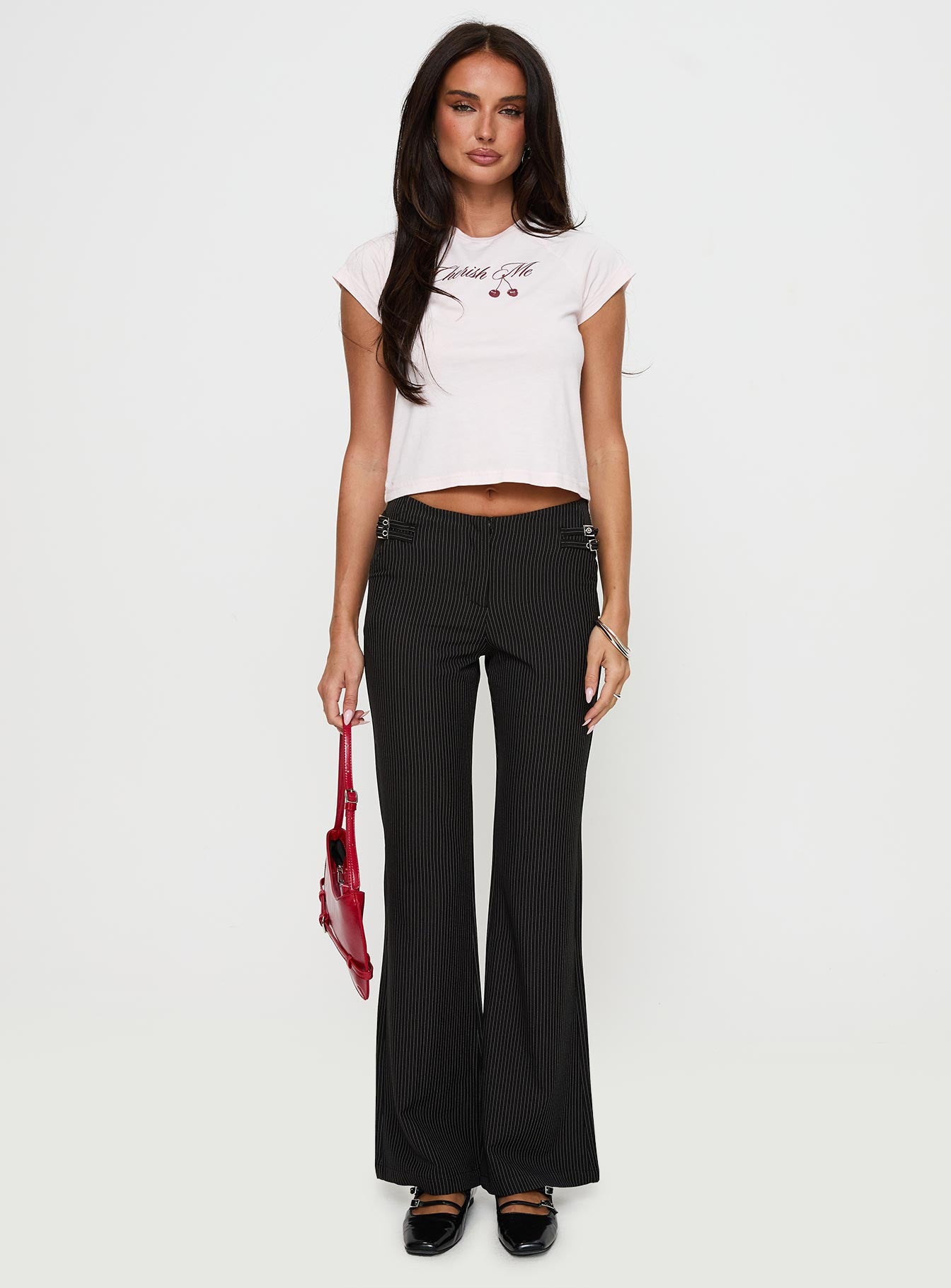 front view of model wearing Princess Polly Sympathiser Pinstripe Pants Black Low Rise Pants 