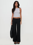 front view of model wearing Princess Polly Sallon Low Rise Pants Black Low Rise Pants 