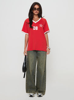 side view of model wearing Princess Polly Spectate Top Red Short Sleeves V-Neck 