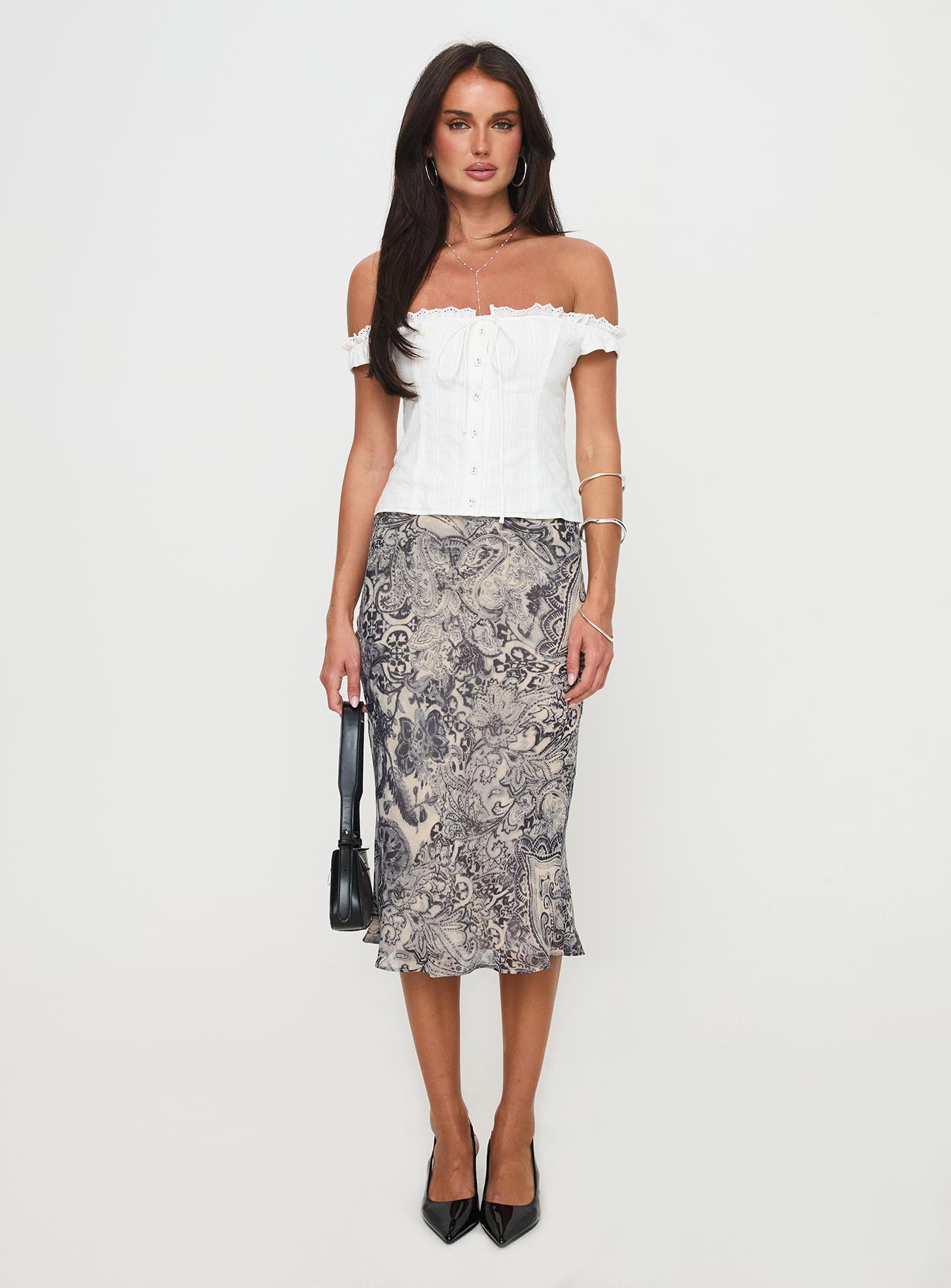 side view of model wearing Princess Polly Matira Corset Top White Short Sleeves straight 