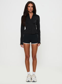 front view of model wearing Princess Polly Celosiah Zip Up Collared Top Black Full Sleeves V-Neck 