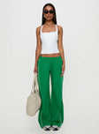 front view of model wearing Princess Polly Field Day Track Pants Green High Waisted Pants 