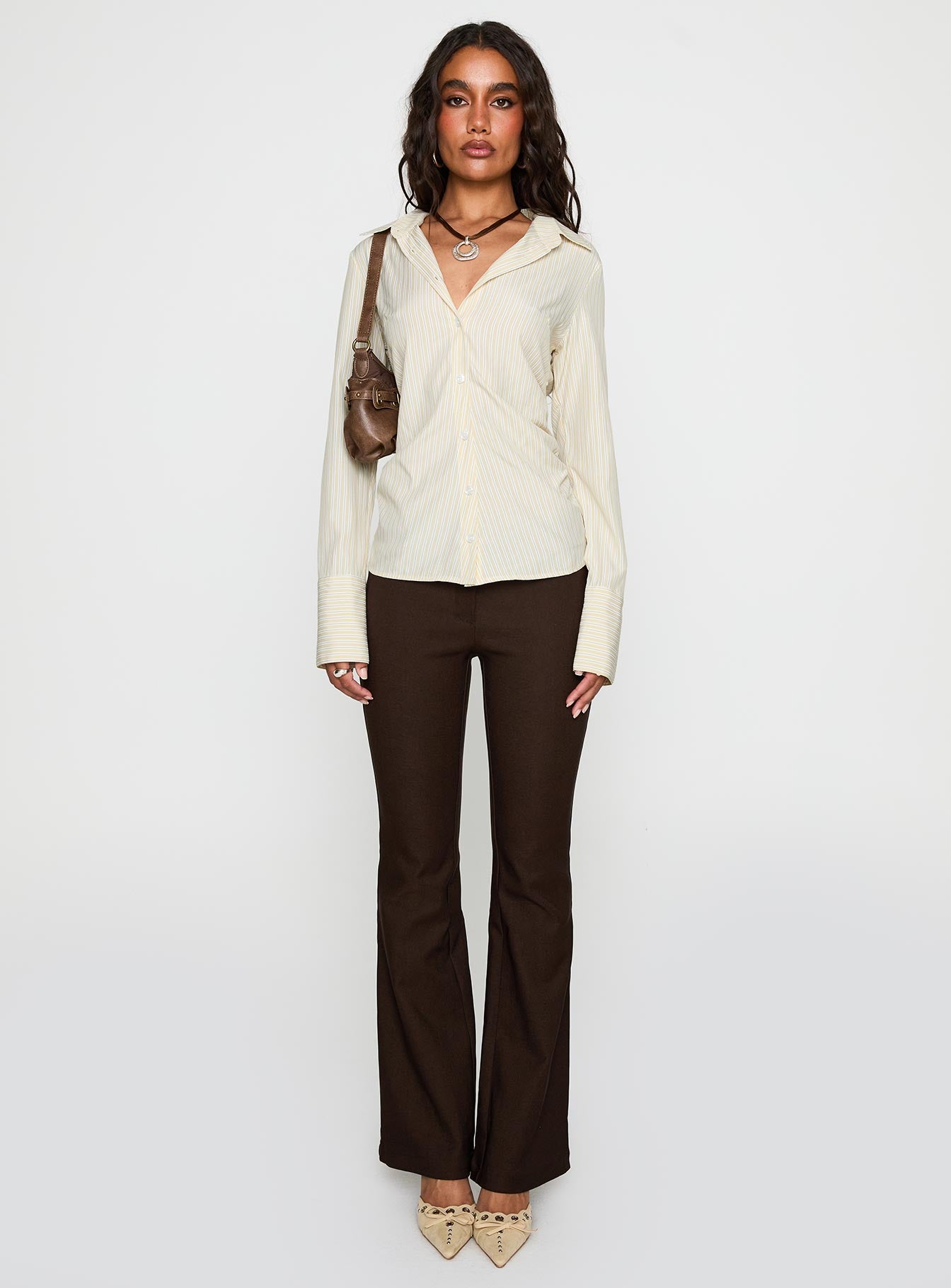 back view of model wearing Princess Polly Rush Hour Long Sleeve Top Yellow Stripe Full Sleeves V-Neck 