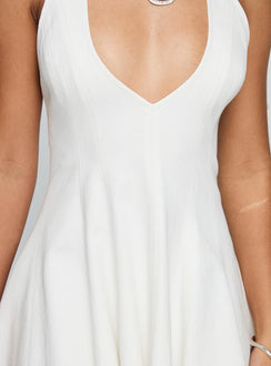 back view of model wearing Princess Polly Out Of Nowhere Halter Mini Dress White Plunger 