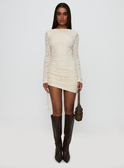 front view of model wearing Princess Polly Que Sera Long Sleeve Mini Dress Cream Boat Neck 