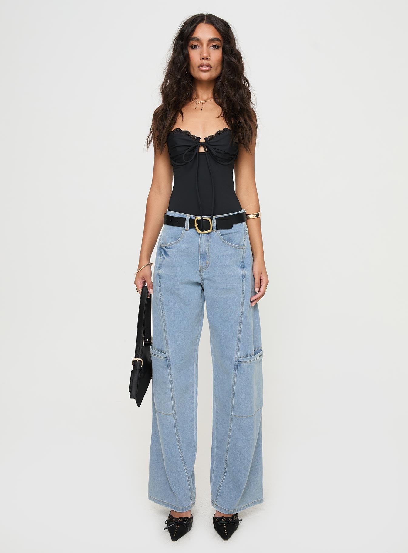 front view of model wearing Princess Polly Calendar Low Rise Jeans Vintage Wash Mid Rise 