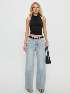 side view of model wearing Princess Polly Henesey High Rise Straight Leg Jeans Light Wash Mid Rise Jeans 