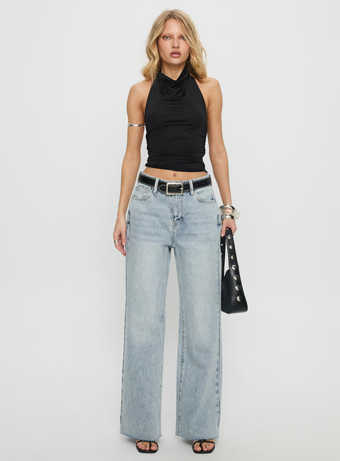 side view of model wearing Princess Polly Henesey High Rise Straight Leg Jeans Light Wash Mid Rise Jeans 