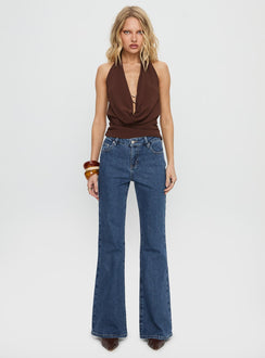 front view of model wearing Princess Polly Magic Mirror Mid Rise Bootleg Jeans Mid Blue Wash Mid Rise Jeans 