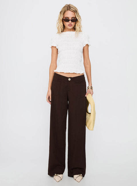 front view of model wearing Princess Polly Vendi Low Rise Pant Chocolate Low Rise Pants 