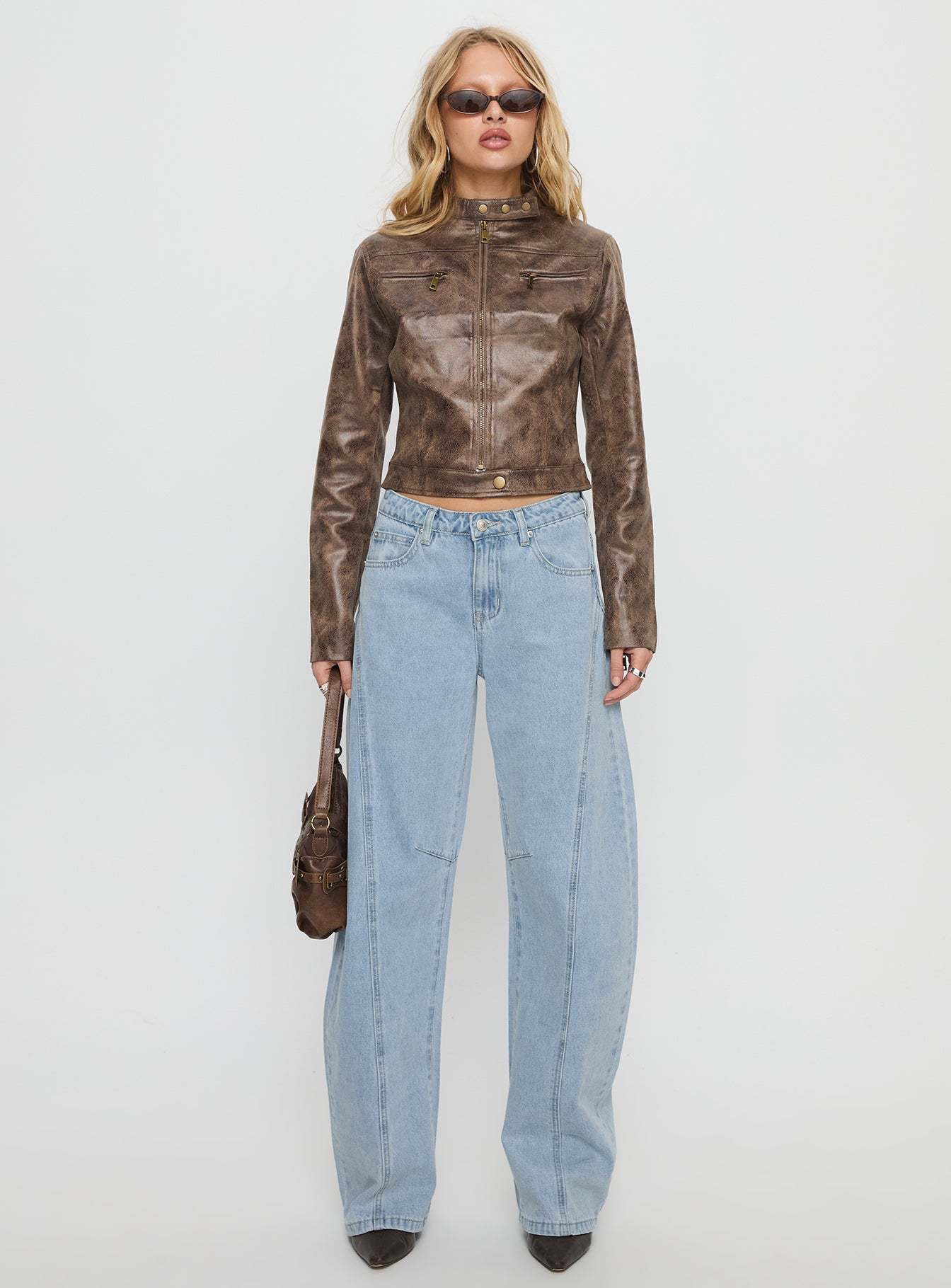 front view of model wearing Princess Polly Lost Track Mid Rise Barrel Leg Jeans Ice Wash Mid Rise Jeans 