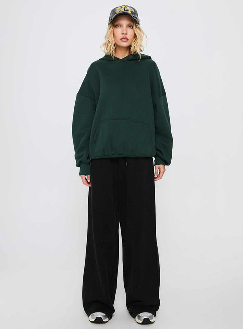 front view of model wearing Princess Polly Good Luck Graphic Hoodie Green / Blue Long 