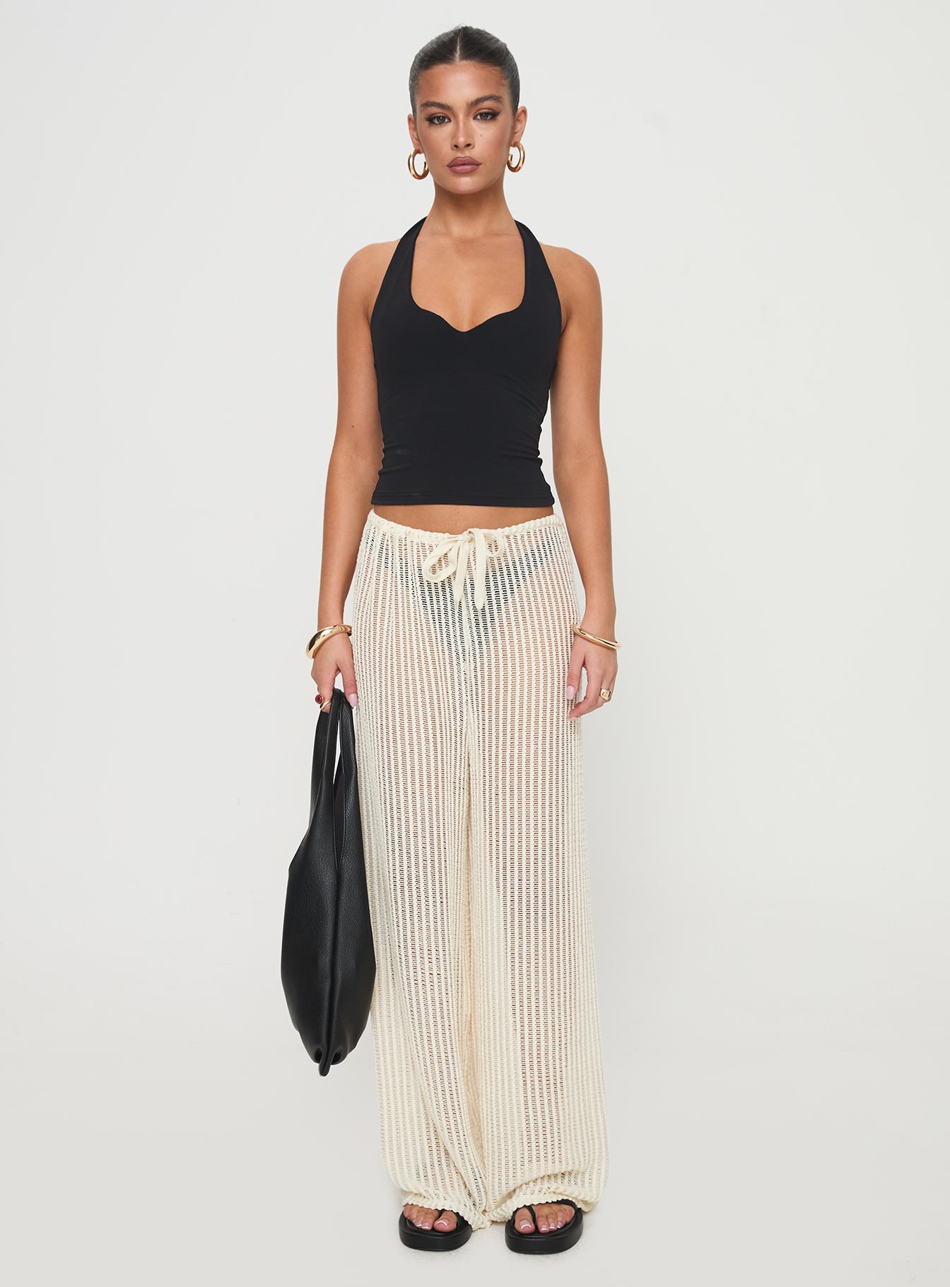 side view of model wearing Princess Polly Darcie Knit Pants Beige High Waisted Pants 