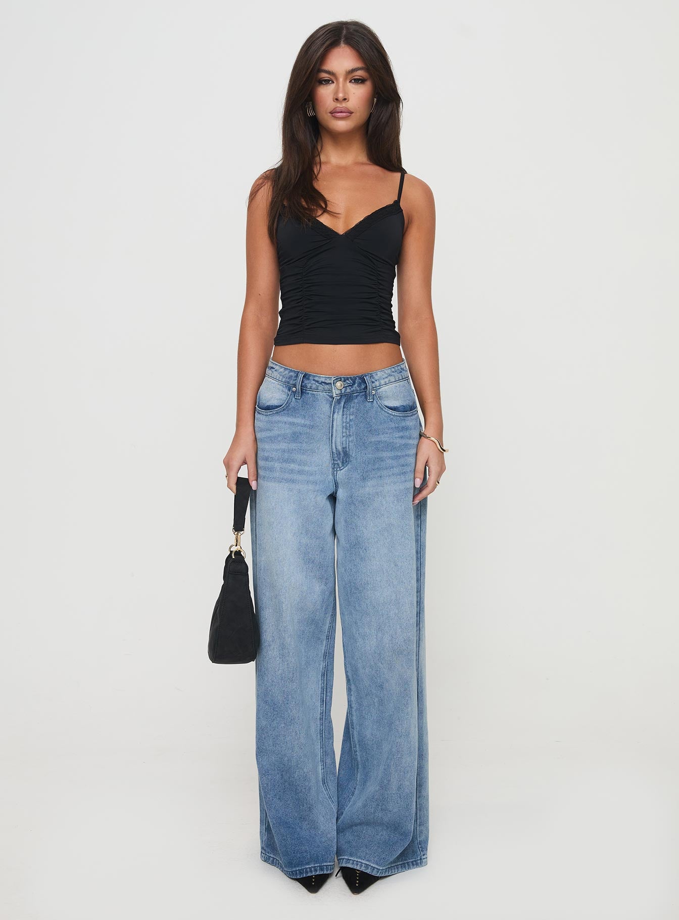 front view of model wearing Princess Polly Perseus Top Black Sleeveless V-Neck 