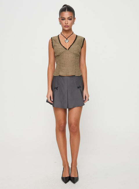 side view of model wearing Princess Polly Hagea Top Olive Sleeveless V-Neck 