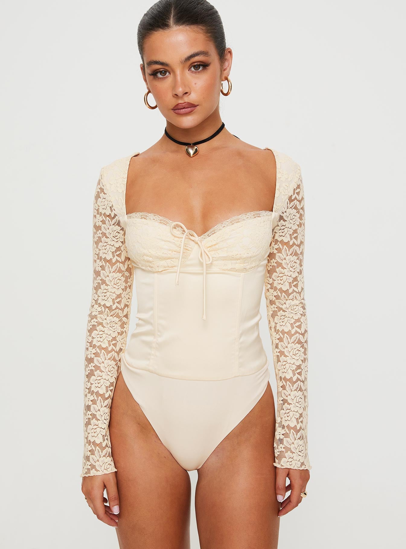 front view of model wearing Princess Polly Markwell Long Sleeve Bodysuit Cream Full Sleeves Sweetheart 