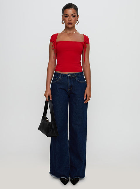 front view of model wearing Princess Polly Daena Tie Detail Top Red Short Sleeves Square Neck 