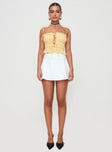 front view of model wearing Princess Polly Sars Top Yellow Sleeveless Square Neck 