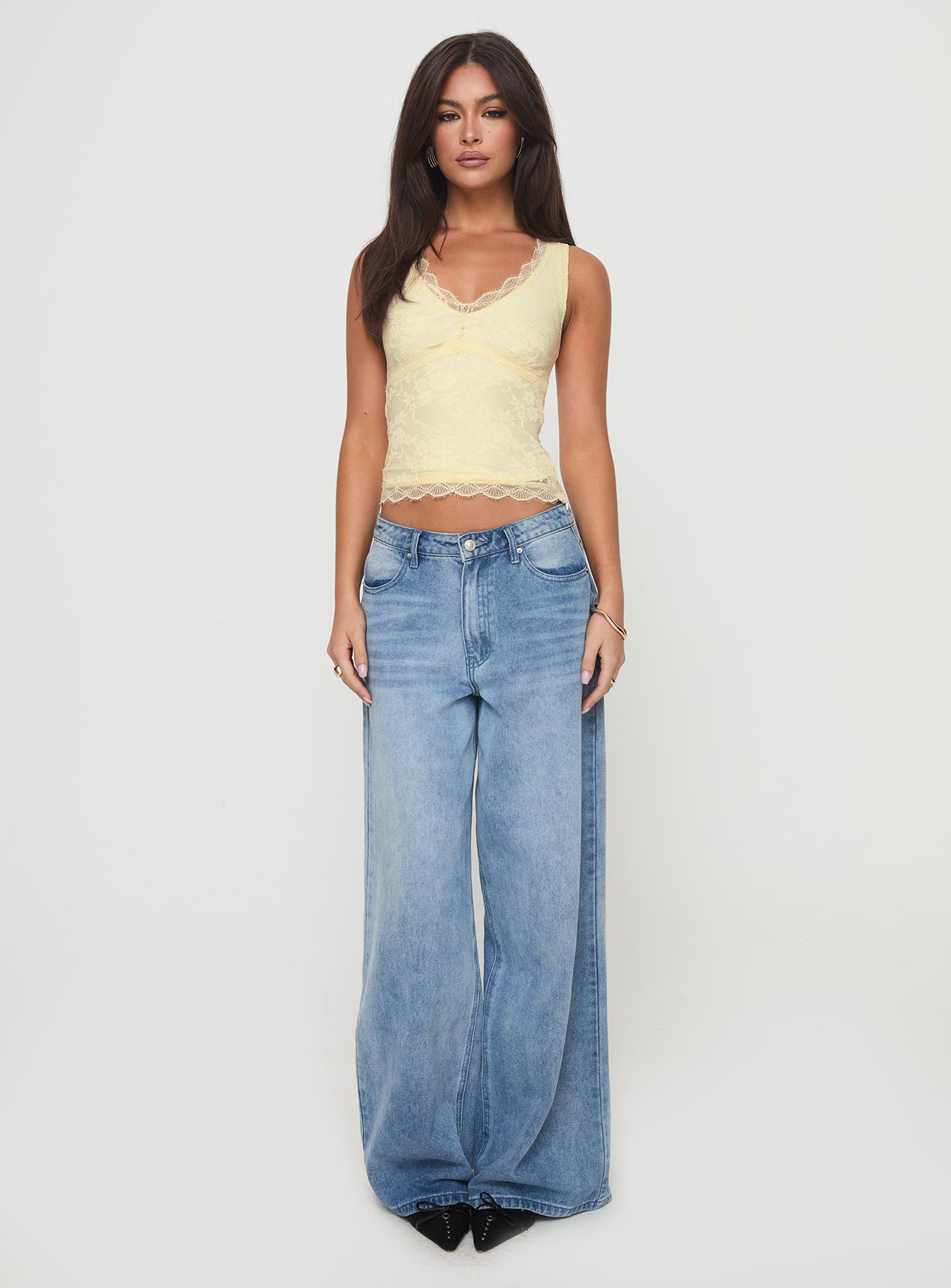 front view of model wearing Princess Polly Far Away Top Yellow Sleeveless Plunger 