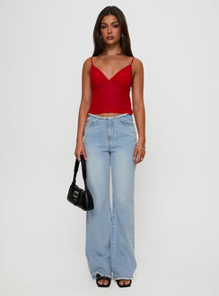 front view of model wearing Princess Polly Hawke Frayed Jeans Mid Blue High Waisted 