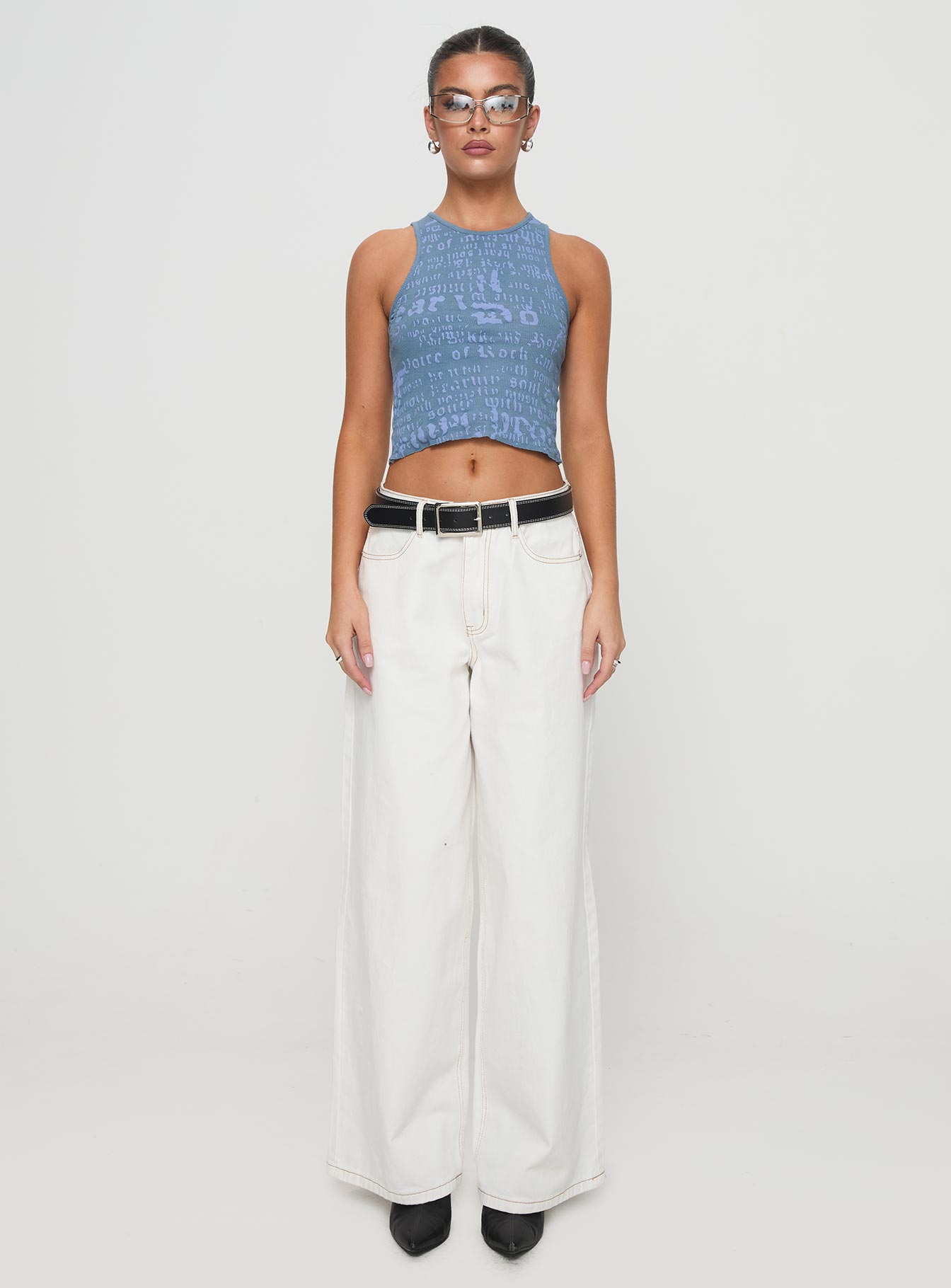 back view of model wearing Princess Polly Abdiel Top Blue Sleeveless Crew Neck 