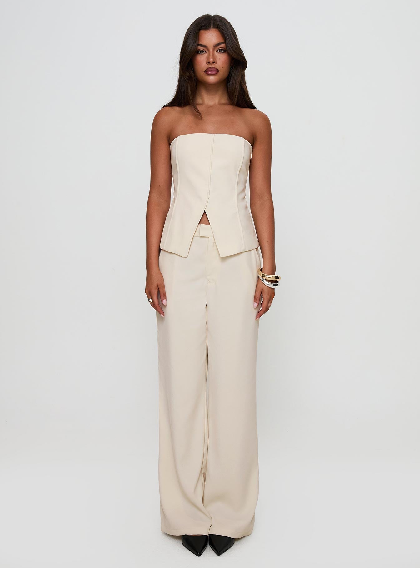 front view of model wearing Princess Polly Lavish Living Strapless Top Cream Sleeveless straight 