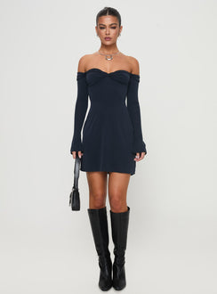 side view of model wearing Princess Polly Suizie Off The Shoulder Mini Dress Navy Sweetheart Neckline 