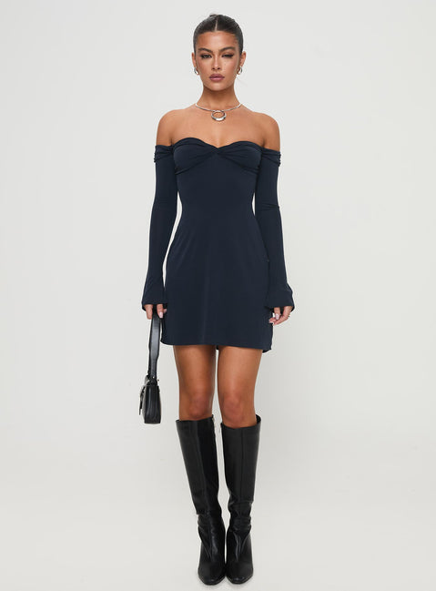 side view of model wearing Princess Polly Suizie Off The Shoulder Mini Dress Navy Sweetheart Neckline 
