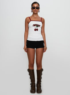 side view of model wearing Princess Polly Cherrie Ties Shirred Graphic Top White Sleeveless Square Neck 