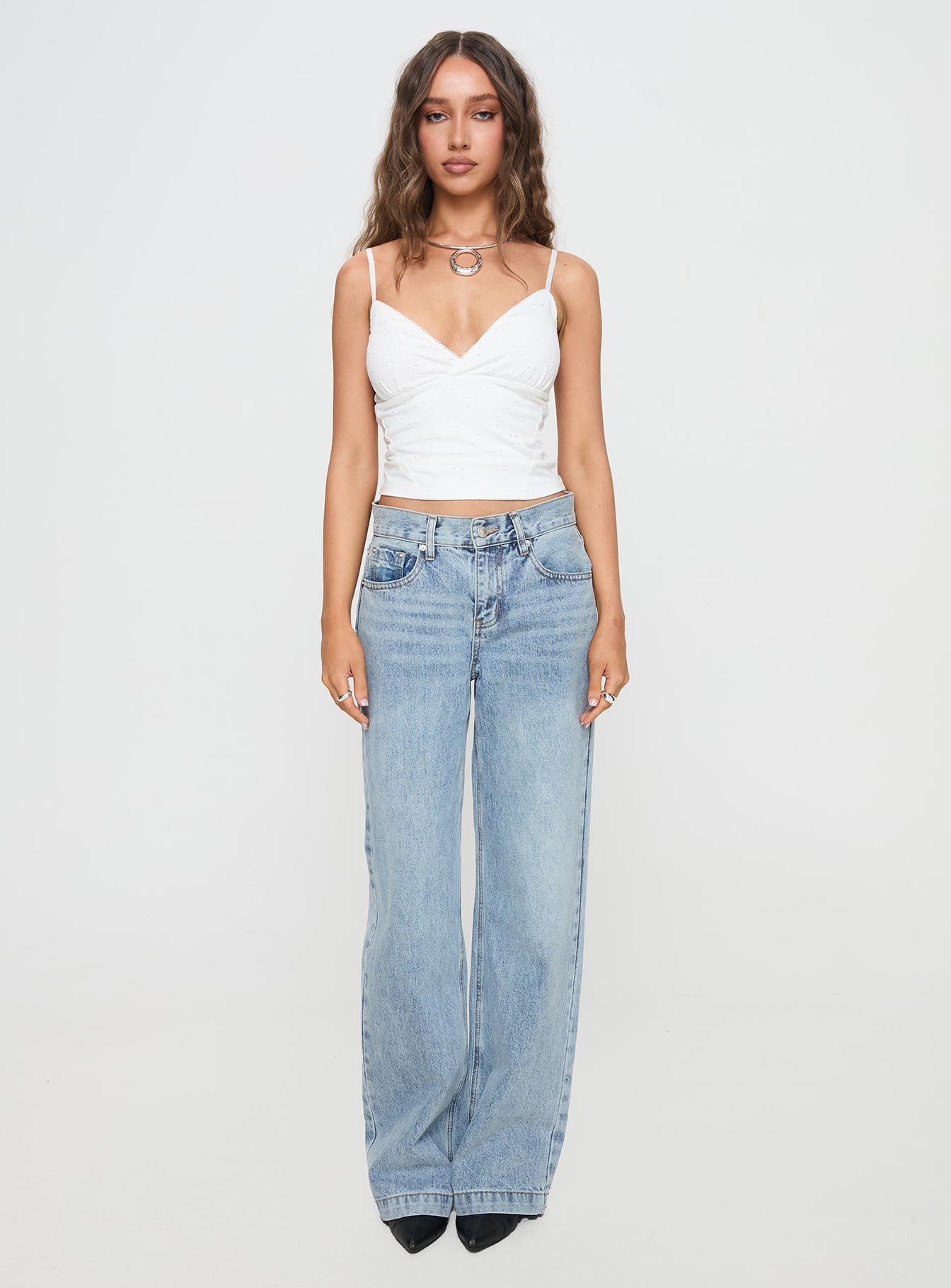 back view of model wearing Princess Polly Plantain Top White Sleeveless V-Neck 