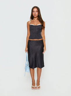   front view of model wearing Princess Polly Somani Satin Midi Skirt Black Polka Dot Midi Skirts 