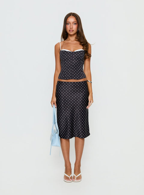   front view of model wearing Princess Polly Somani Satin Midi Skirt Black Polka Dot Midi Skirts 