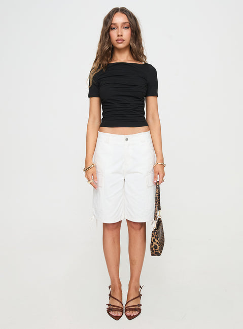 front view of model wearing Princess Polly Bleachers Shorts White High Waisted Shorts 