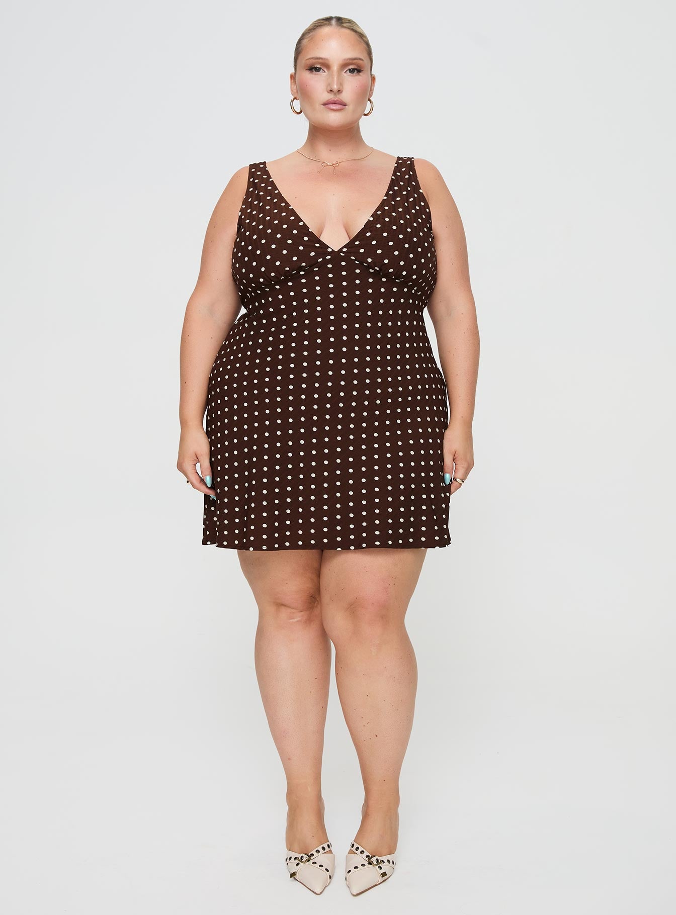 front view of model wearing Princess Polly Nellie Mini Dress Brown Polka Dot Curve Plunger 
