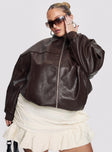 Brown Bomber jacket Oversized fit, faux leather material, classic collar, zip front fastening, ribbed waistband and cuffs, twin hip pockets