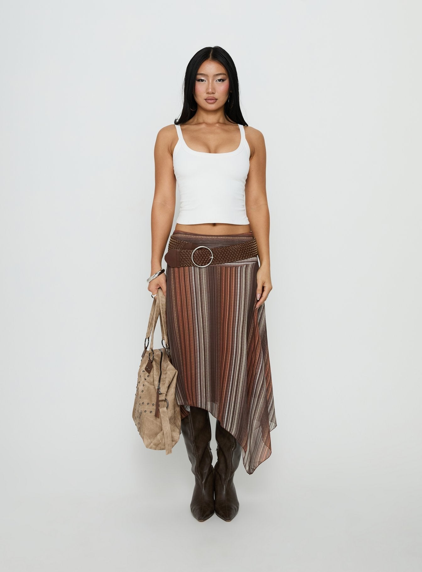 Showcasing the Massino Asymmetrical Midi Skirt Multi Stripe womens-skirts featuring midi length with belt and relaxed fit front view of model wearing Princess Polly