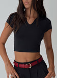 bLACK Top Cropped fit, short sleeves, v cut detail in neckline