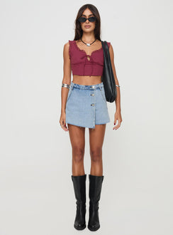 front view of model wearing Princess Polly Josue Denim Wrap Skort Light Blue Wash High Waisted Shorts 