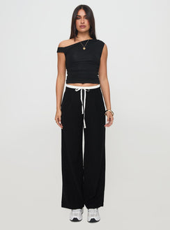 side view of model wearing Princess Polly Burna Pants Black High Waisted Pants 