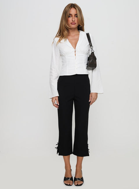 front view of model wearing Princess Polly Work Of Art Long Sleeve Top White Full Sleeves V-Neck 