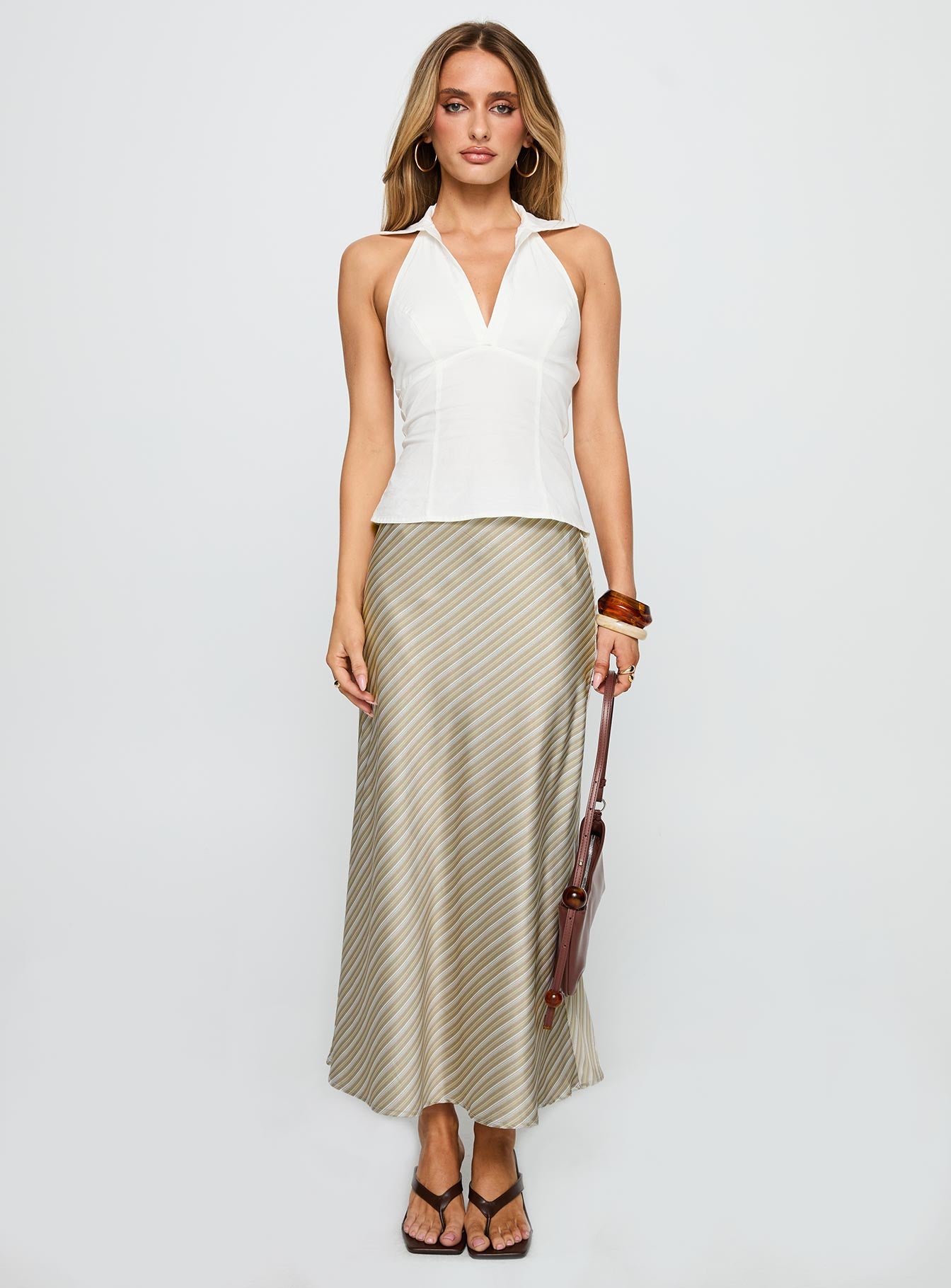   front view of model wearing Princess Polly Mixed Signals Midi Skirt Brown Stripe Midi Skirts 