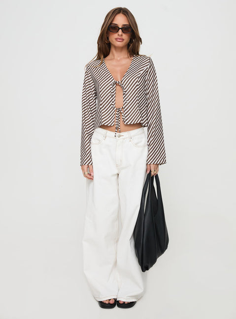 front view of model wearing Princess Polly Maxette Long Sleeve Tie Top Brown Stripe Full Sleeves V-Neck 