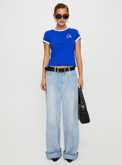 side view of model wearing Princess Polly La Galaxy Logo Top Blue Short Sleeves Crew Neck 