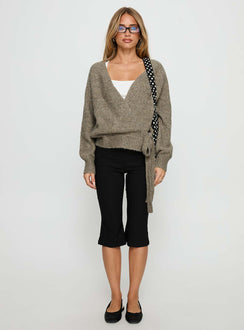 side view of model wearing Princess Polly Daelan Wrap Knit Cardigan Brown Cropped Jumpers 