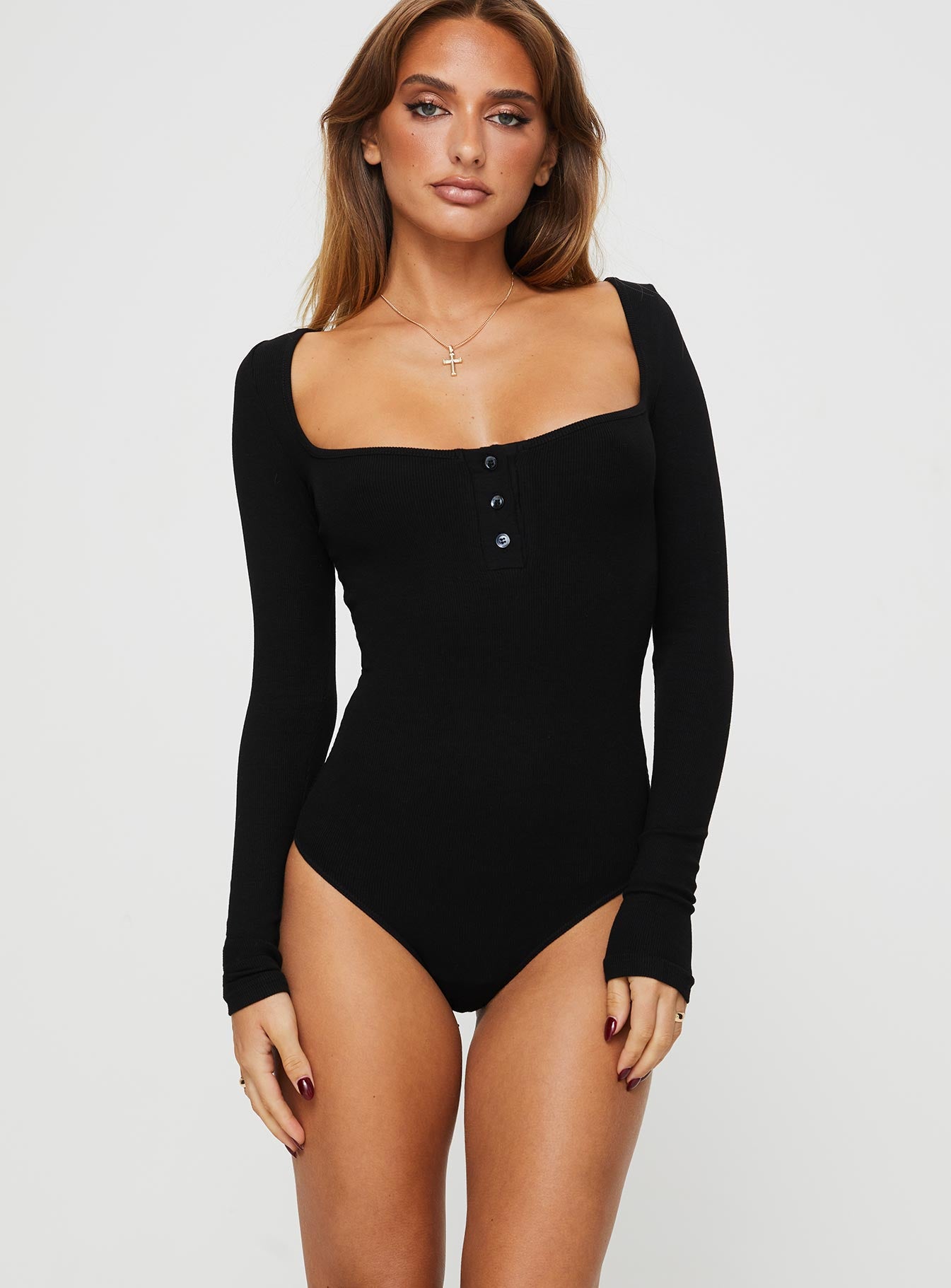 front view of model wearing Princess Polly Ballard Long Sleeve Bodysuit Black Full Sleeves Square Neck 
