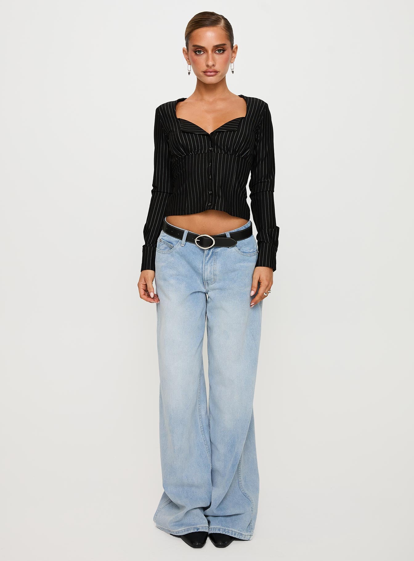 back view of model wearing Princess Polly Set For Life Foldover Detail Long Sleeve Top Black / White Pinstripe Full Sleeves V-Neck 