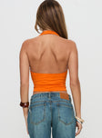 back view of model wearing Princess Polly Irina Multi-wear Top Orange Sleeveless Asymmetric Neckline 